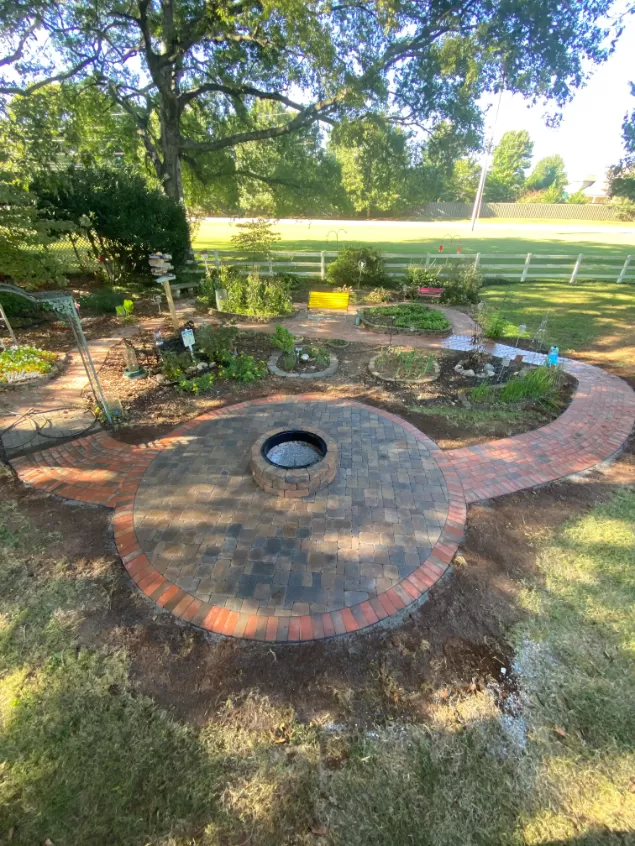 Brick Sidewalk Leading to a Paver Fire Pit in Huntsville, AL