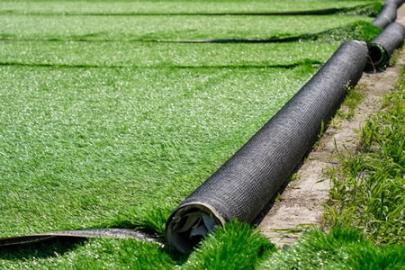 Backyard artificial turf installation in hampton cove al